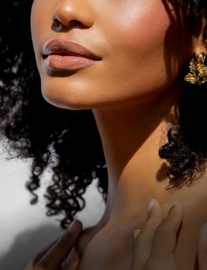 Close-up of a woman's face and neck.