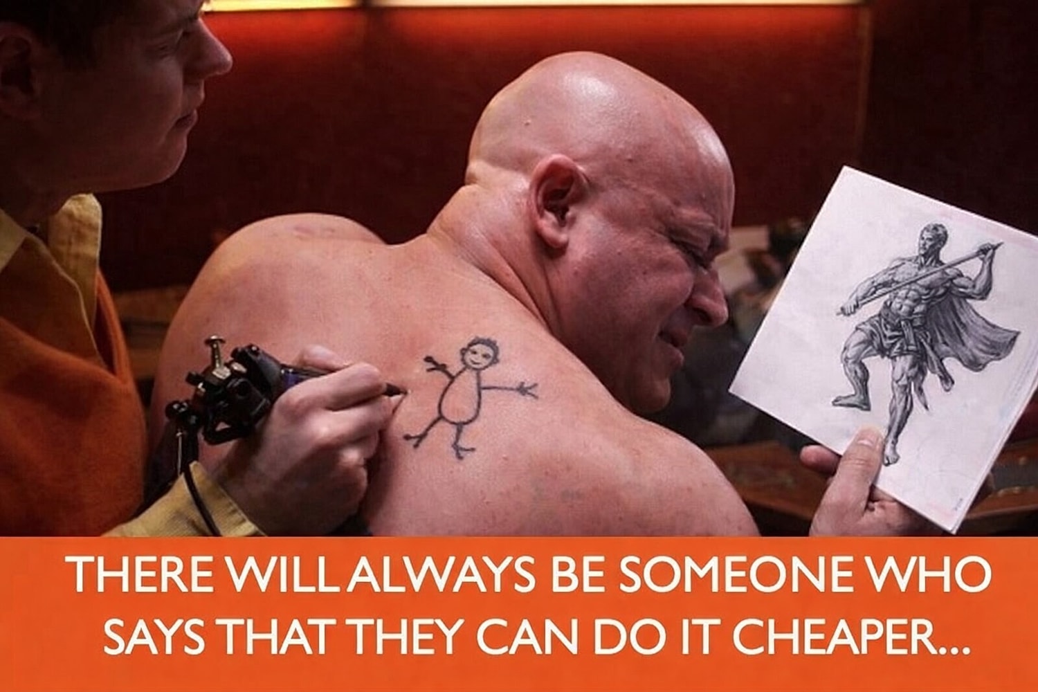 Tattooing a simple design on a man's back.